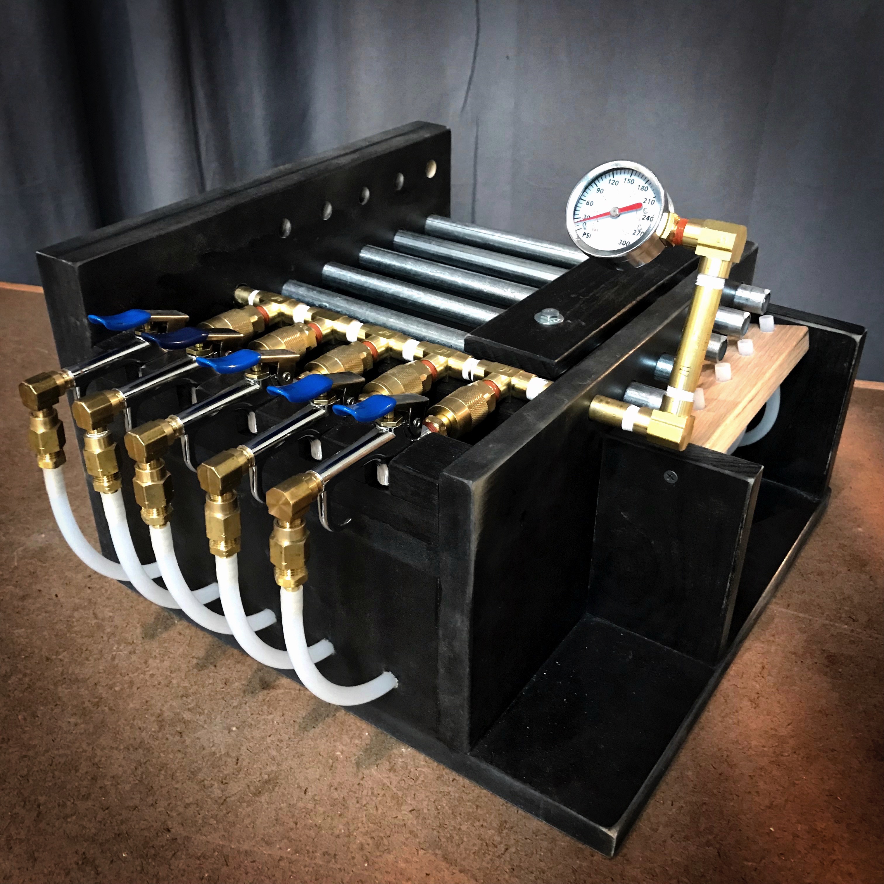 A photo of a custom built compressed air sound effect device.